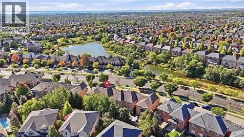 Aerial perspective showcasing a residential area with varied housing styles - 2409 Postmaster Drive, Oakville, ON 