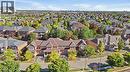 Residential neighborhood featuring established homes, mature trees, and paved roadways - 2409 Postmaster Drive, Oakville, ON 