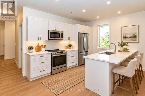 Staging AI generated - decor/appliances not incl. - 33 Shaw Crescent, Huntsville (Chaffey), ON 