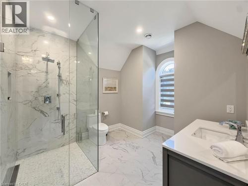Glass-enclosed shower with full-height marble-finish walls - 236 Poplar Drive, Burlington, ON 
