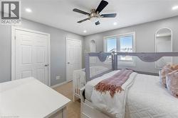 Recessed lighting, ceiling fan fixture, and window with blinds - 