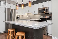 Solid surface countertops in kitchen - 