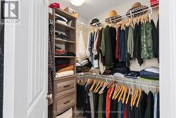 Walk in closet primary bedroom - 