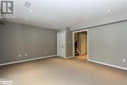 Lower level rec room w/potlights - 