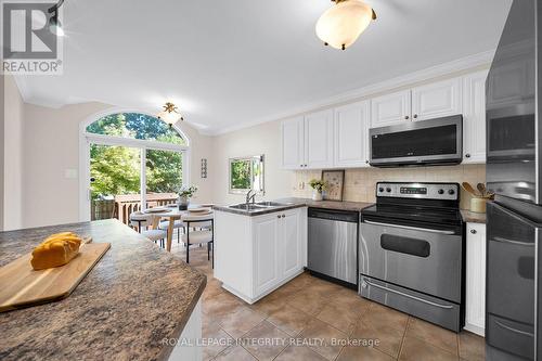 Kitchen with stainless steel appliances - 170 Flamborough Way, Ottawa, ON 