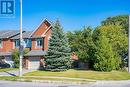 End-unit exterior with oversized side yard - 170 Flamborough Way, Ottawa, ON 