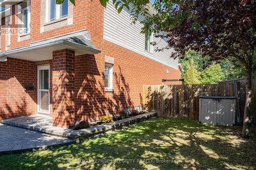 Fully fenced backyard with mature trees - 170 Flamborough Way, Ottawa, ON 