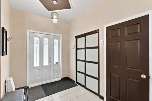 Hall d'entrée/Vestibule - 6343 Rue Antoine-Manseau, Longueuil (Saint-Hubert), QC 