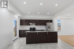 Open Concept Kitchen with Breakfast Bar - 