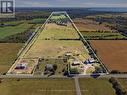 Farm buildings plus mix of trees and arable land - 939 Kelly Road, Prince Edward County (Athol Ward), ON 