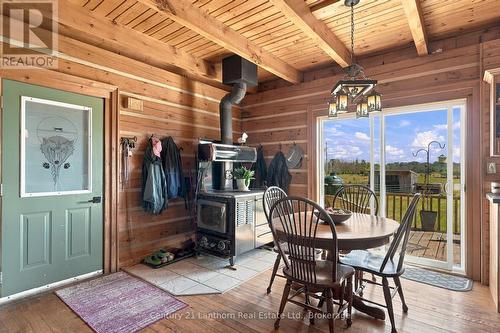 Eat-in kitchen with wood burning cookstove - 939 Kelly Road, Prince Edward County (Athol Ward), ON 