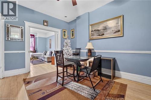 Light wood-finish flooring with white trim and a wide doorway - 199 N Locke Street N, Hamilton, ON 