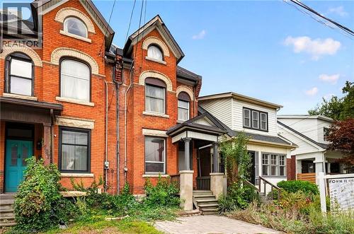 Brick facade with arched window details - 199 N Locke Street N, Hamilton, ON 
