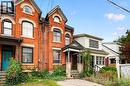 Brick facade with arched window details - 199 N Locke Street N, Hamilton, ON 