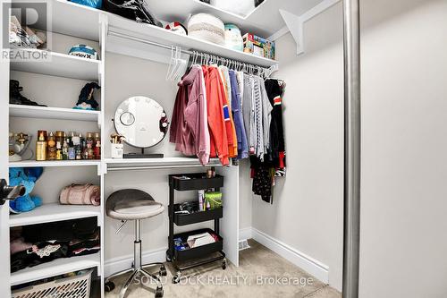 Walk in Closet with Fire Poll to Family Room - 7040 Donwel Drive, Ottawa, ON 