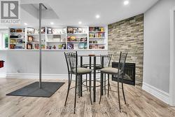 Games Area with Gas Fireplace - 