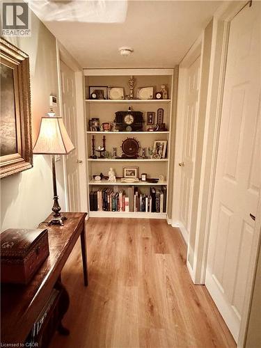 Built-in shelving unit providing storage and display space - 40 Stornoway Crescent, Huron East, ON 