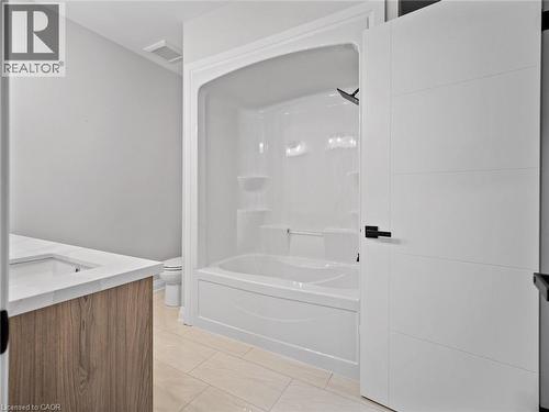 Bathroom with vanity and washtub / shower combination - 230 Knoll Street, Port Colborne, ON 