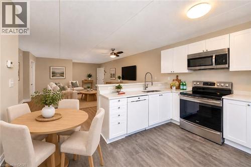 Virtually staged/digitally enhanced - 1421 Walkers Line Unit# 205, Burlington, ON 