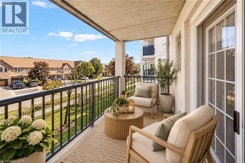 Virtually staged/digitally enhanced - 1421 Walkers Line Unit# 205, Burlington, ON 