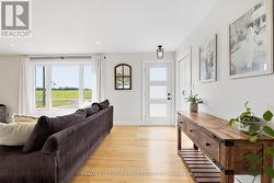 Entry with hardwood floors - 