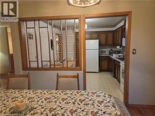 Wood-finish room divider with decorative screens - 410 Lakeview Drive, Waterloo, ON 