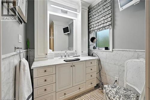 Built-in vanity with extensive storage and a single basin sink - 2209 Ghent Avenue, Burlington, ON 