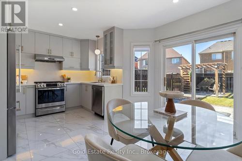 A lookout to backyard & huge door to Patio - 6653 Opera Glass Crescent, Mississauga, ON 