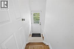 White paneled door with a round knob - 
