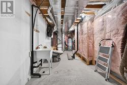Unfinished basement area-w/lots of storage space - 