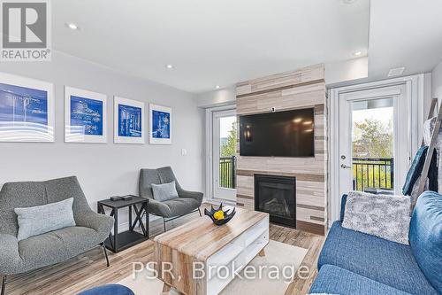 Living Area & Fireplace - 308 - 4 Anchorage Crescent, Collingwood, ON 