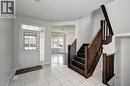 Entryway with white tile flooring - 236 Ridge Road, Cambridge, ON 