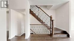 Stairway Leading to Upper Floor - 