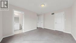 Primary Bedroom with Ensuite + His/Hers Closets - 