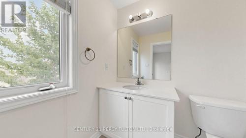 Ensuite Bathroom with Vanity and Window - 64 Ferris Square, Clarington, ON 
