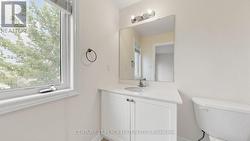 Ensuite Bathroom with Vanity and Window - 
