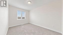 Upper Floor Second Bedroom Overlooking Front Yard - 