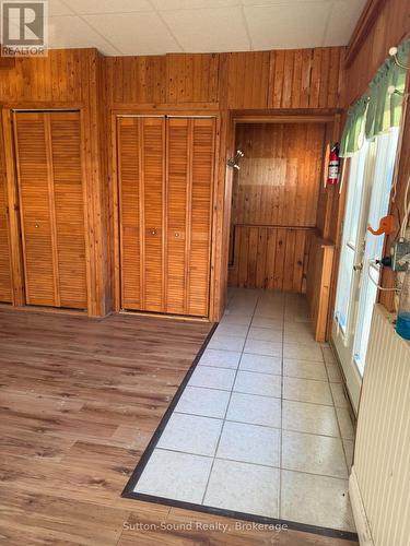 lots of storage in family room with a walk out - 108 Wilson Drive, Georgian Bluffs, ON 