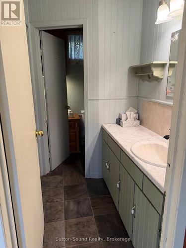 main floor bathroom with a water closet - 108 Wilson Drive, Georgian Bluffs, ON 