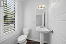 Powder Room off Entrance - 32 Escallonia Court, Ottawa, ON 