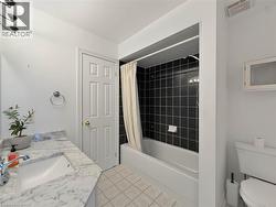 White single vanity with an integrated rectangular sink and a gray-veined countertop - 