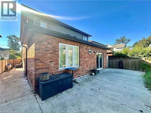 Brick exterior with a second-story gray facade - 5 Arden Avenue, Hamilton, ON 