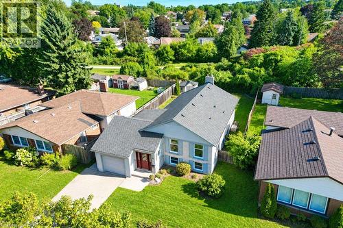 Contemporary residential structure with a light blue exterior and white trim - 34 Wayne Drive, Kitchener, ON 