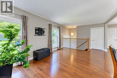 Gleaming hardwood floors in spacious open concept kitchen and living room - 34 Wayne Drive, Kitchener, ON 