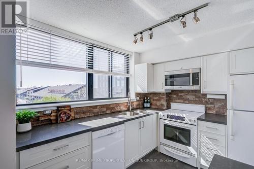 Bright Kitchen with south facing windows. - 301 - 250 Queens Quay W, Toronto, ON 