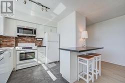Kitchen with tile floors. - 