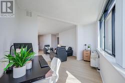 View from den towards living room. - 