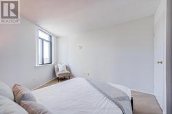 Bedroom with ample room for reading chair. - 