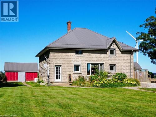 Historic schoolhouse transformed into house - 1635 Lakeshore Road, Clear Creek, ON 
