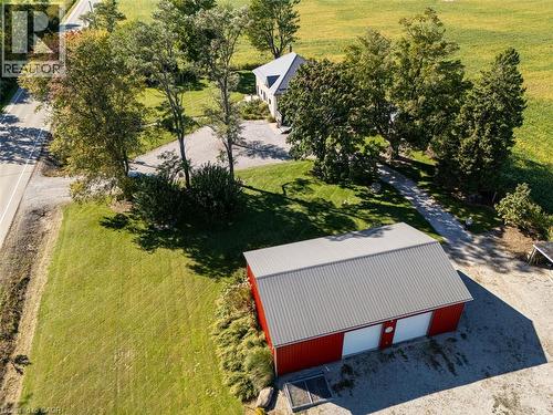 Aerial view of house and shop - 1635 Lakeshore Road, Clear Creek, ON 